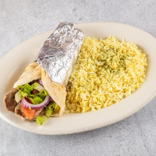 Gyro Served on Pita with Tzatziki Sauce